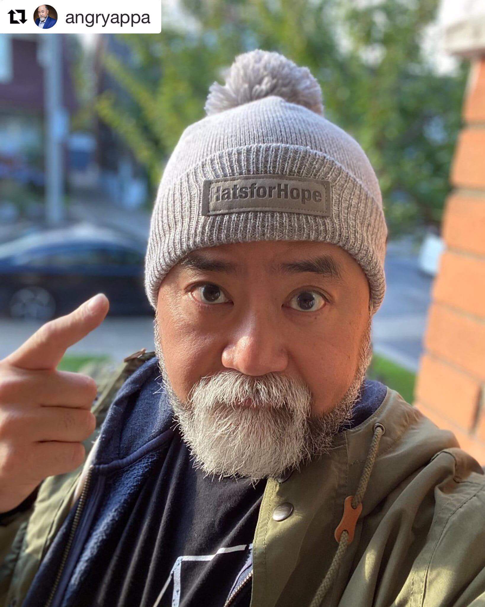 Actor Paul Sun-Hyung Lee (Kim's Convenience) wearing his Hats for Hope toque.