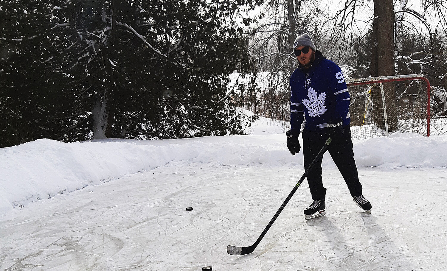 Cancer survivor skating on a pond