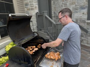 Justin cooking on the BBQ
